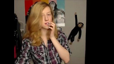 18 year old teenager takes off her red brassiere and demonstrates off her succulent massive tits.