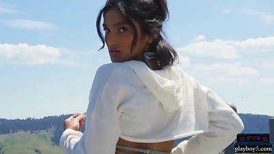 Indian milf model stripteasing outdoor and plays with a hose