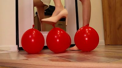 high-heeled slippers kick balloons crushing heels