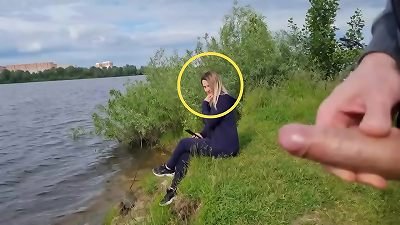 A guy witnesses a girl alone by the river and demonstrates her his dick
