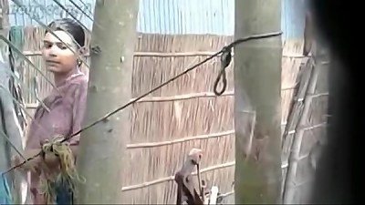 Village Bhabhi bathing in open bath